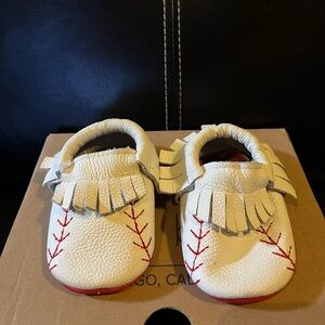Bird Rock Baby brand “Home Run” genuine leather baby moccasins. Worn once.